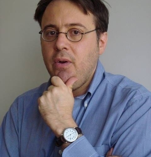 Headshot of Adam Cohen